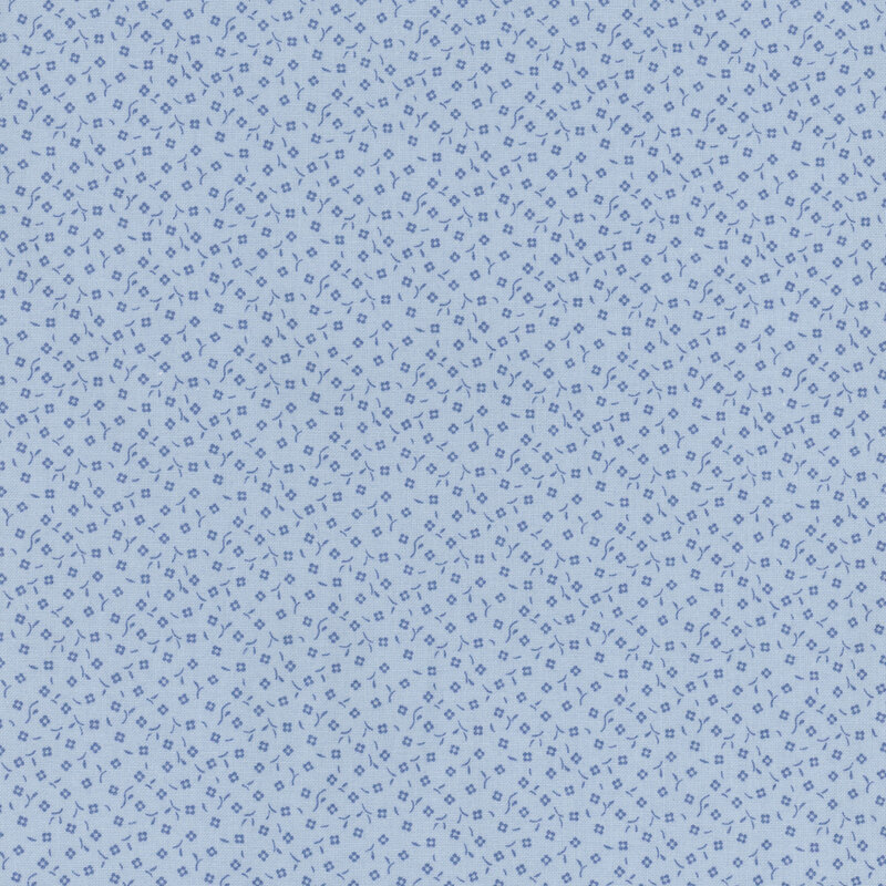 Light blue fabric featuring a repeated pattern of small square shapes.