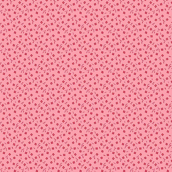 Pink fabric featuring a repeated pattern of small square shapes.