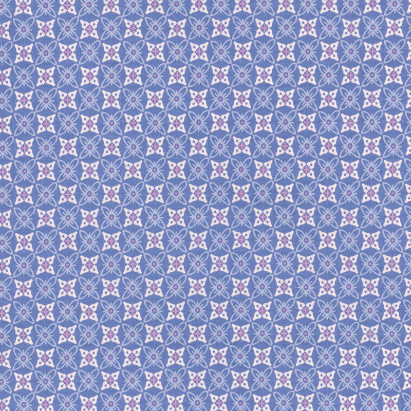 Light blue fabric with a repeating geometric design of floral shapes.