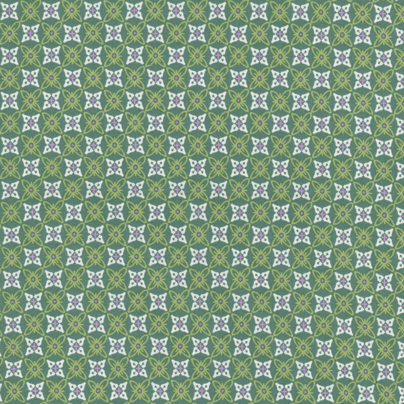 Teal fabric with a repeating geometric design of floral shapes.