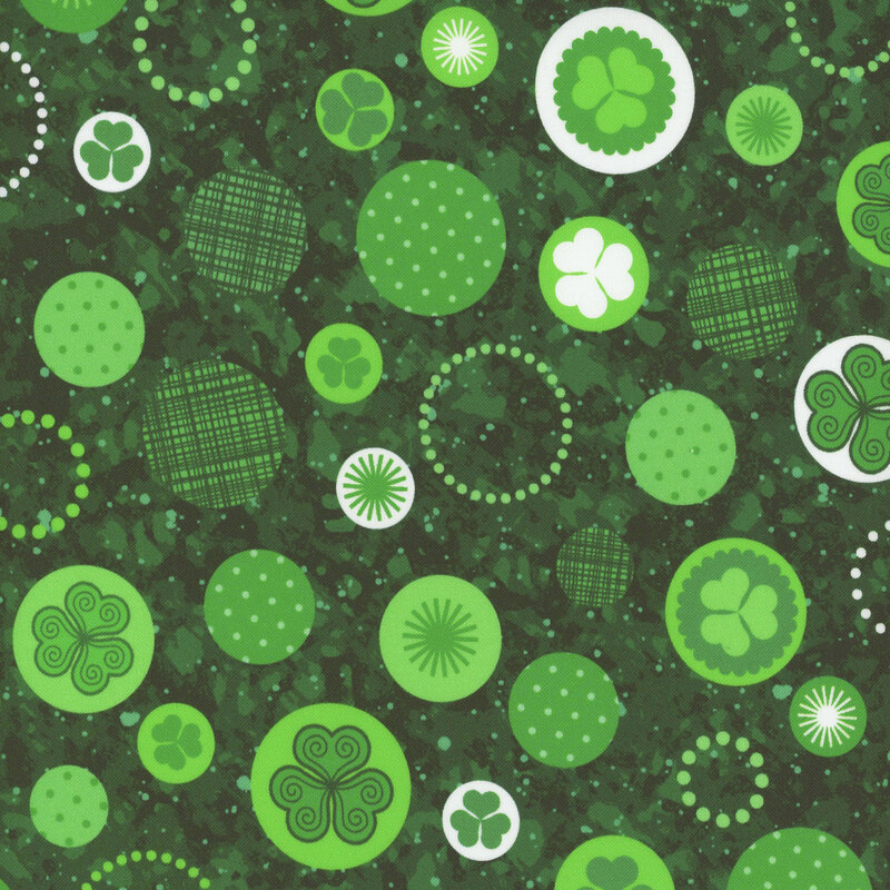 A green patterned background featuring various circles with clovers and different designs.