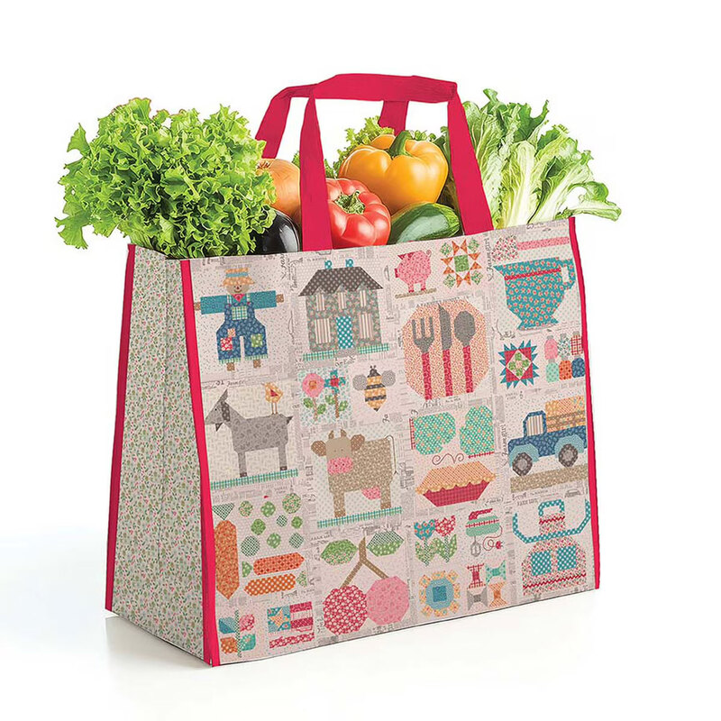 Front of the Farmer's Daughter Vinyl Tote showcasing a vintage design with vegetables poking through the top, isolated on a white background.