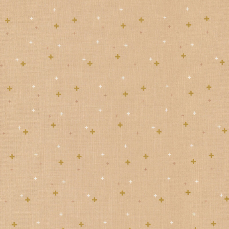 Tan fabric with gold metallic plus signs/crossed lines scattered all over.