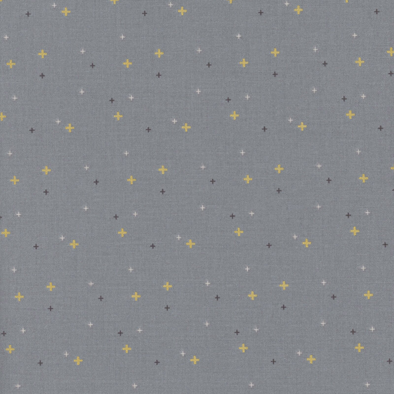 Gray fabric with gold metallic plus signs/crossed lines scattered all over.