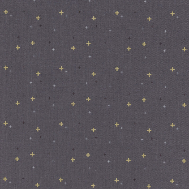 Dark gray fabric with gold metallic plus signs/crossed lines scattered all over.