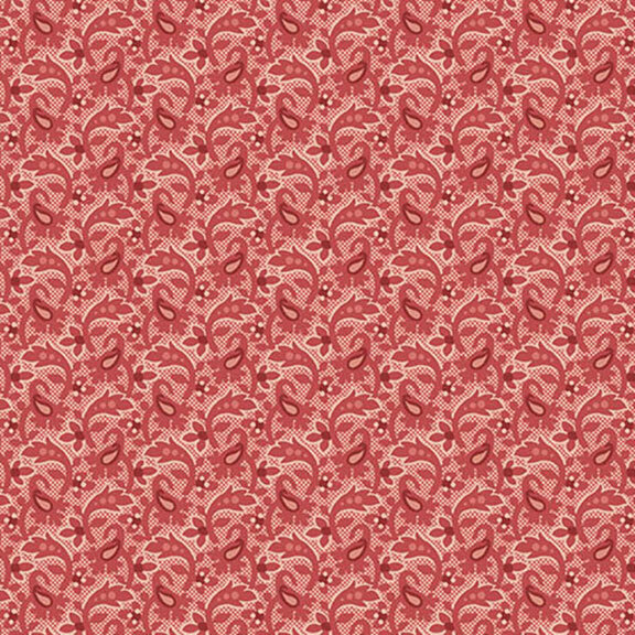 Red floral pattern on a soft red fabric, creating a decorative textile design.