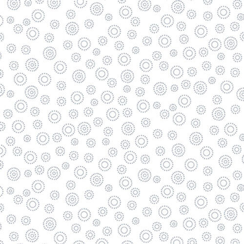 White-on-white fabric with a design of tossed stippled circles.