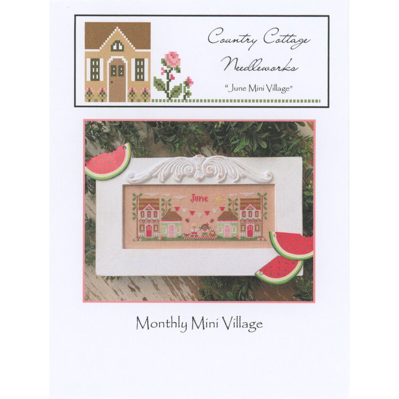 Front of the June Mini Village pattern by Country Cottage Needleworks, featuring a stitched scene of a village in June.