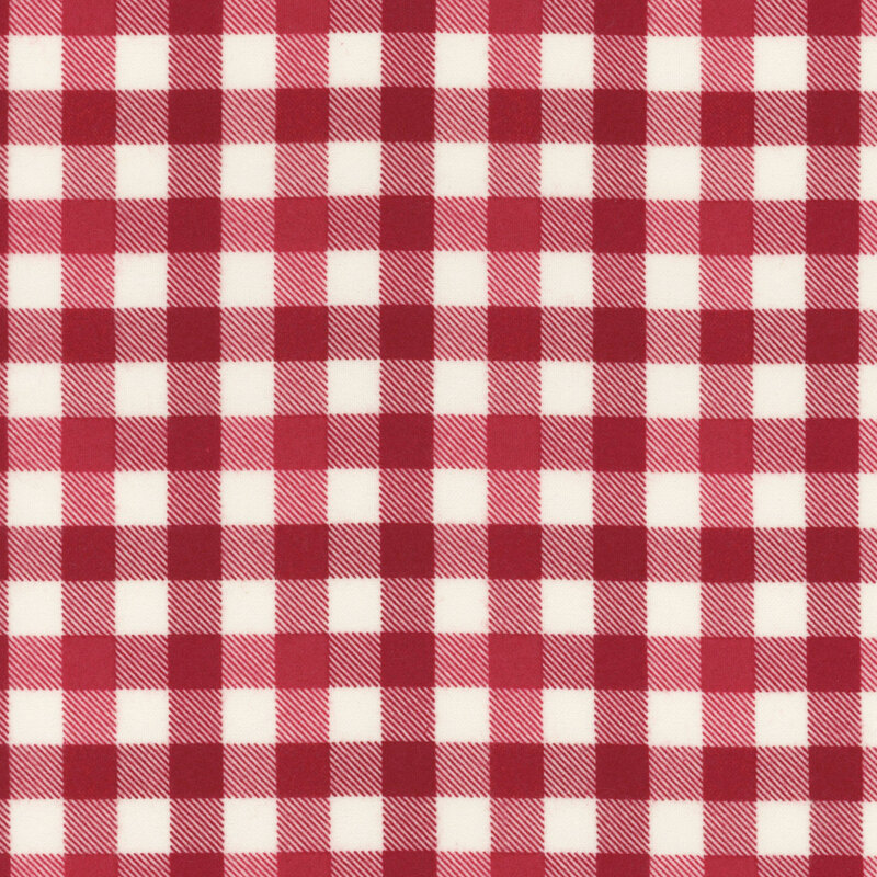 red and white gingham fabric with alternating squares in different shades of green.