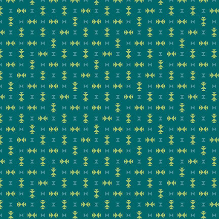 Blue fabric featuring scattered geometric designs in green and teal.