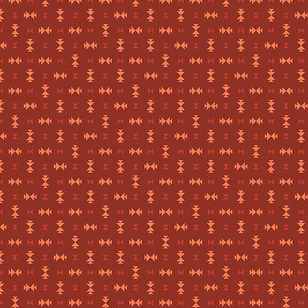 Tonal red fabric featuring scattered geometric designs.