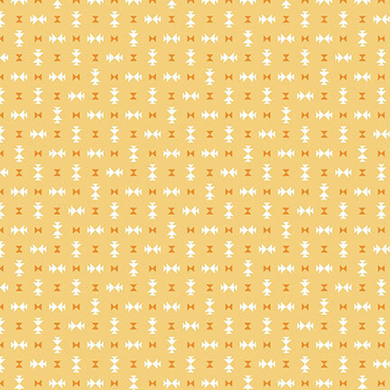 Yellow fabric featuring scattered geometric designs in orange and white.