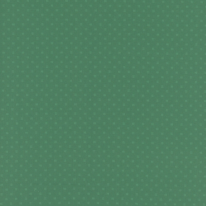 Tonal green fabric with scattered double-dash lines.