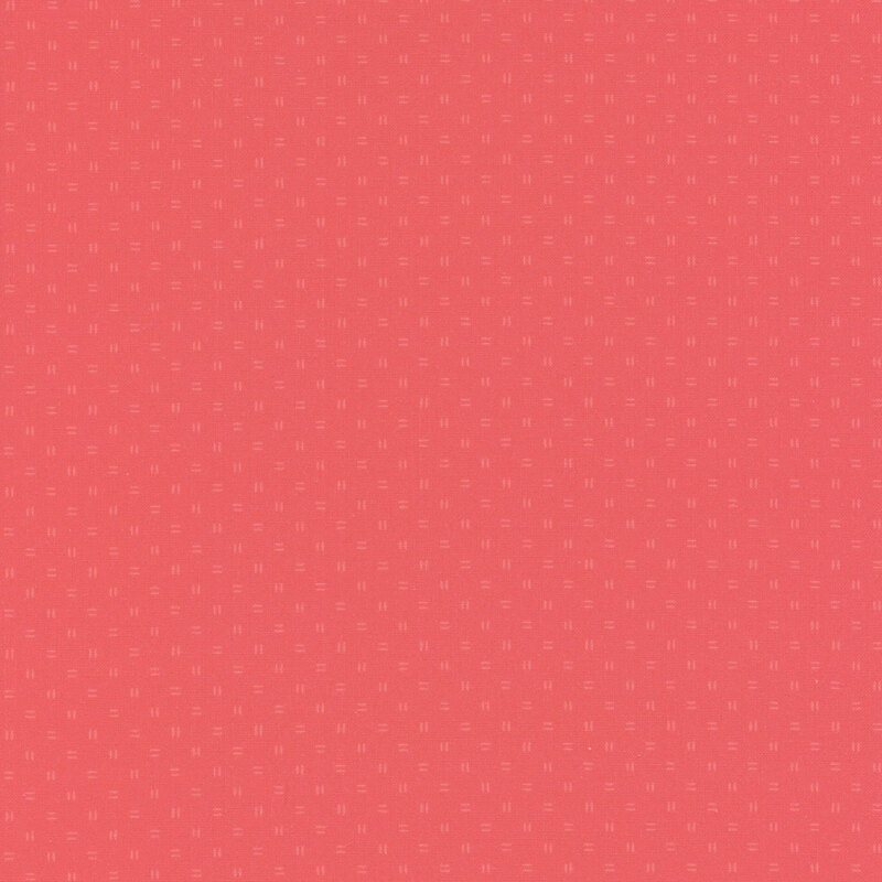 Tonal red fabric with scattered double-dash lines.