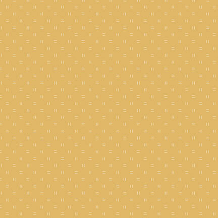 Tonal yellow fabric with scattered double-dash lines.