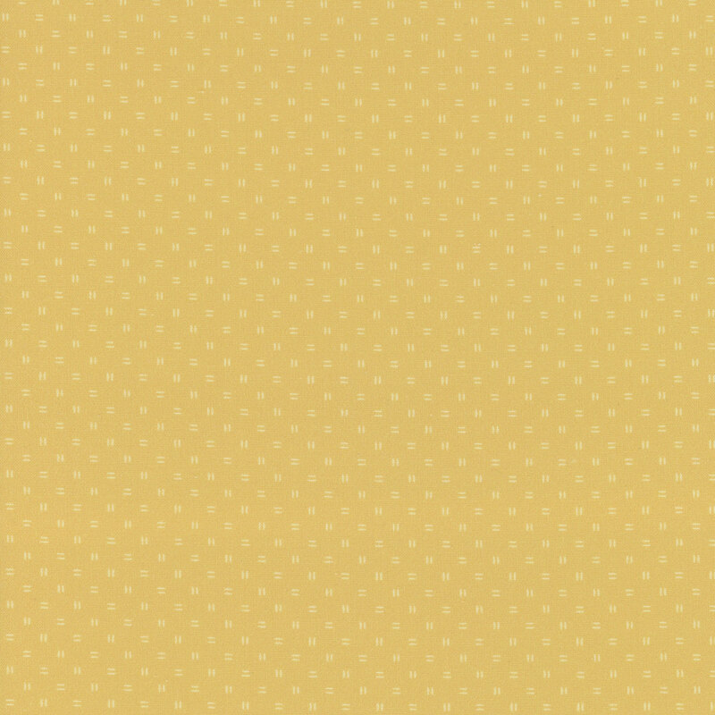 Tonal yellow fabric with scattered double-dash lines.