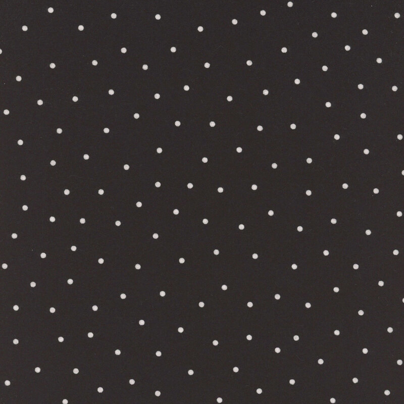 Jet black flannel fabric with scattered white dots.