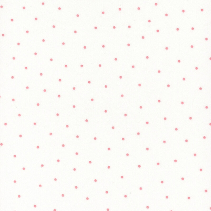 White flannel fabric with scattered pink dots.