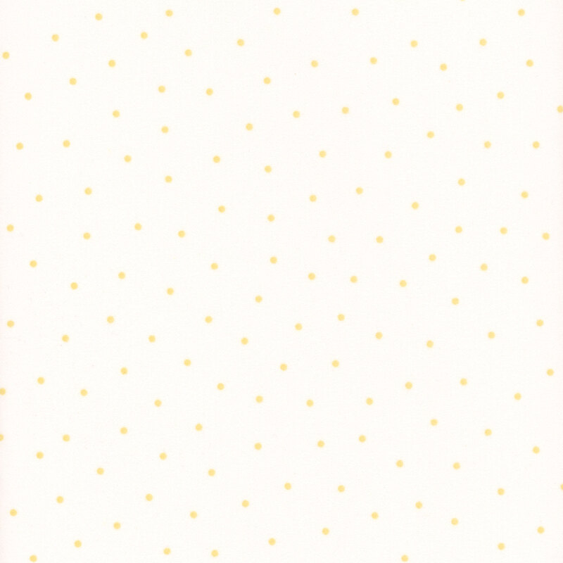 White flannel fabric with scattered yellow dots.