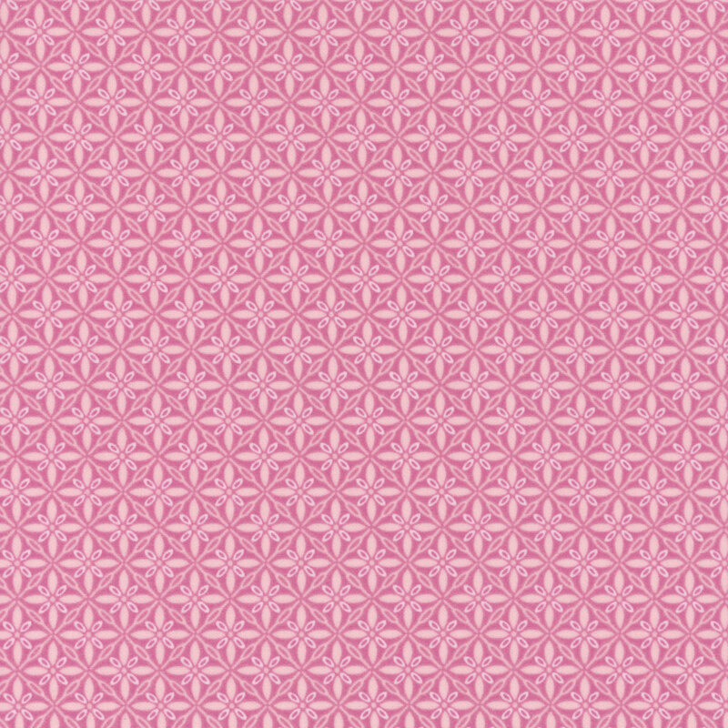 Piglet pink fabric with ornamental florals in a lattice pattern.