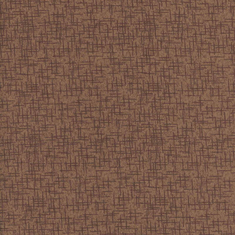 Brown fabric with tonal crosshatching textures.