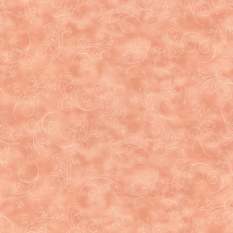 pale peach fabric featuring tonal mottling and scattered scrolling