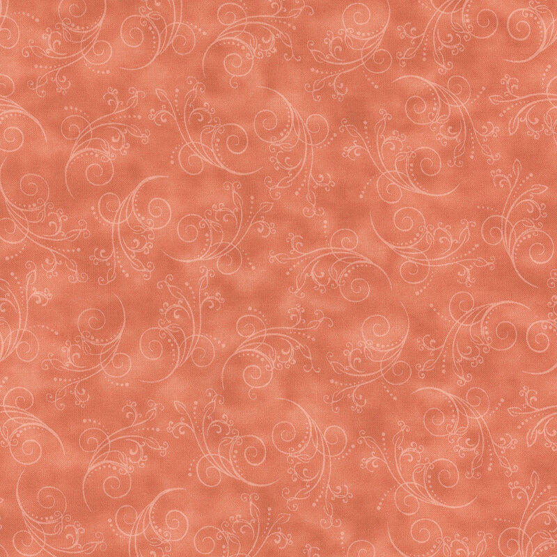 gorgeous light terracotta fabric featuring tonal mottling and scattered scrolling