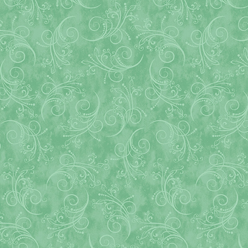 gorgeous seaglass green fabric featuring tonal mottling and scattered pastel scrolling