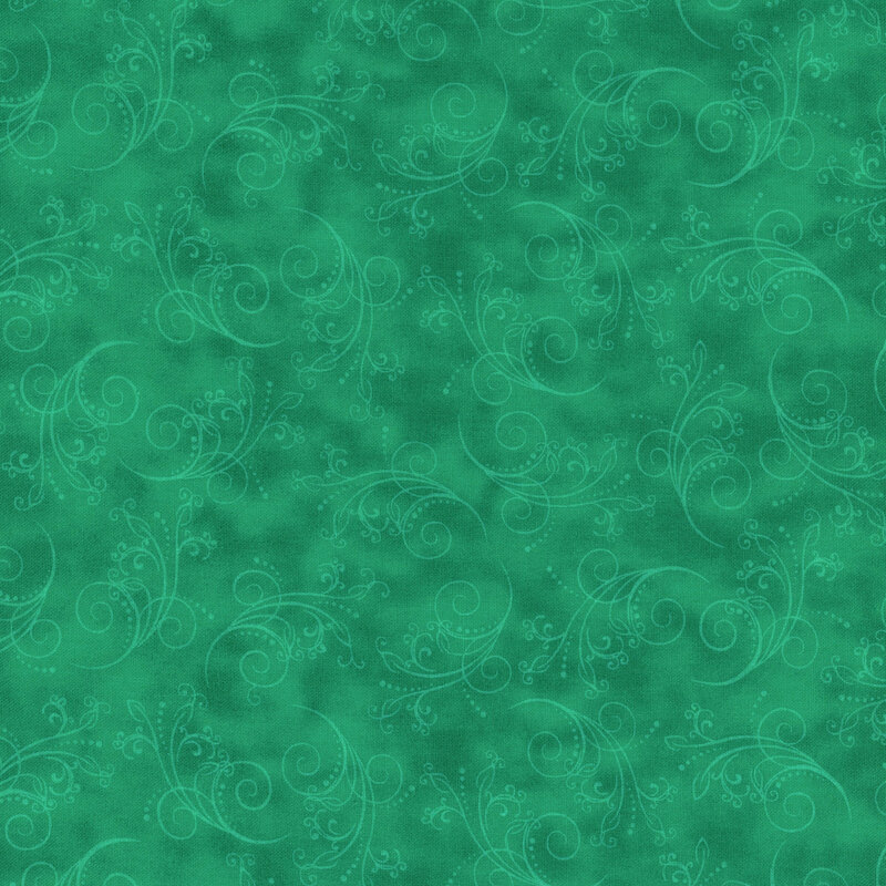 gorgeous emerald green fabric featuring tonal mottling and scattered scrolling