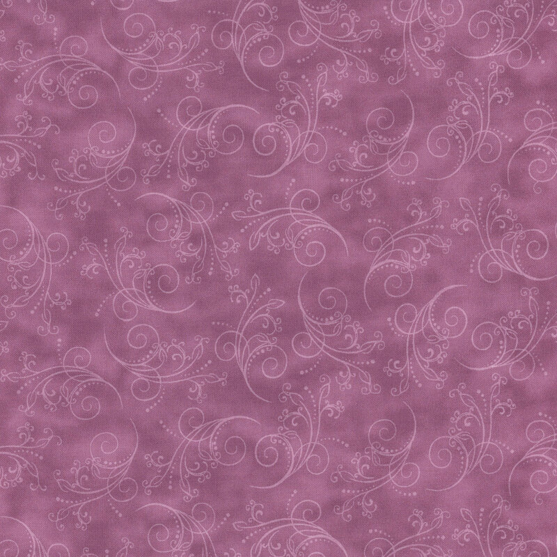 mauve fabric featuring tonal mottling and scattered scrolling