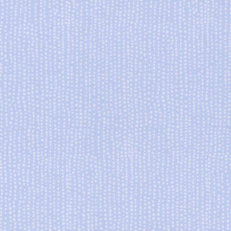 Light periwinkle fabric with vertical rows of wobbly tonal dots.
