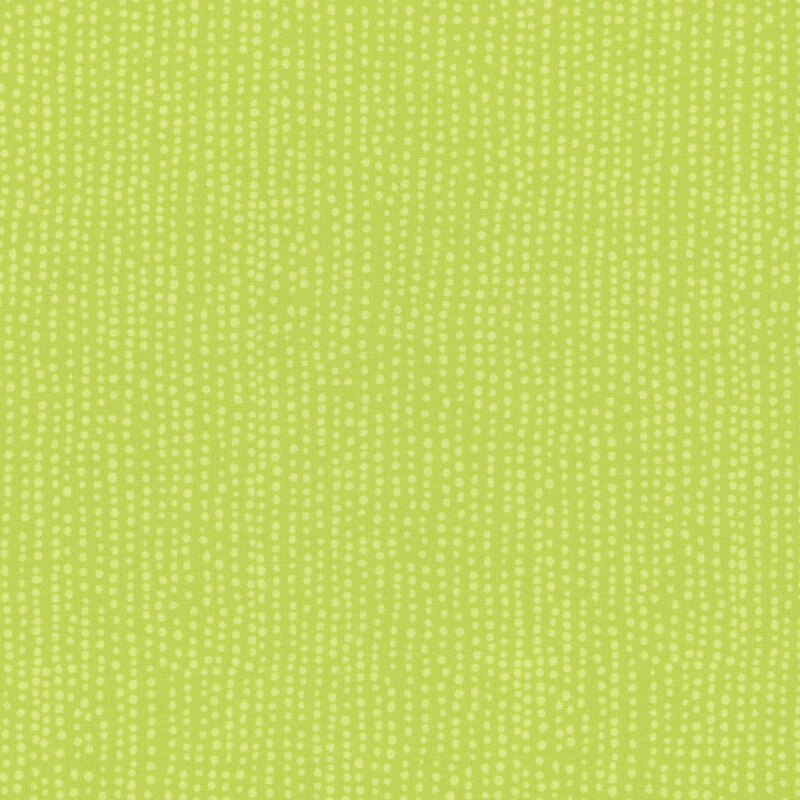 Medium chartreuse fabric with vertical rows of wobbly tonal dots.