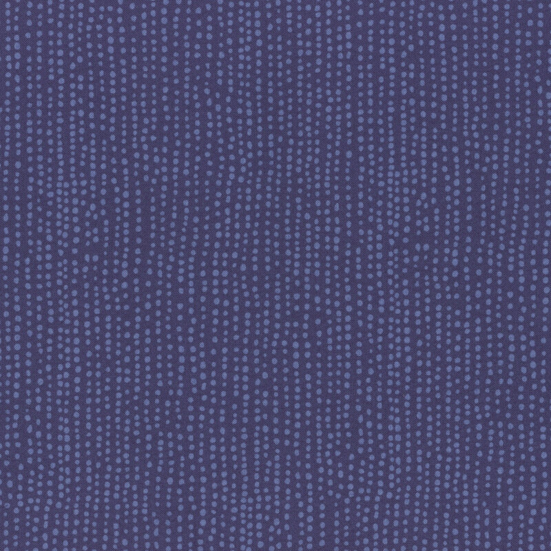 Indigo fabric with vertical rows of wobbly tonal dots.