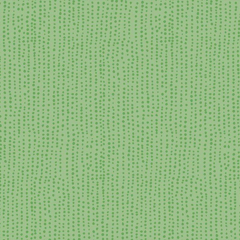 Kiwi green fabric with vertical rows of wobbly tonal dots.