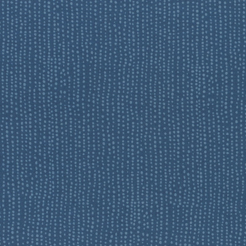 Navy blue fabric with vertical rows of wobbly tonal dots.