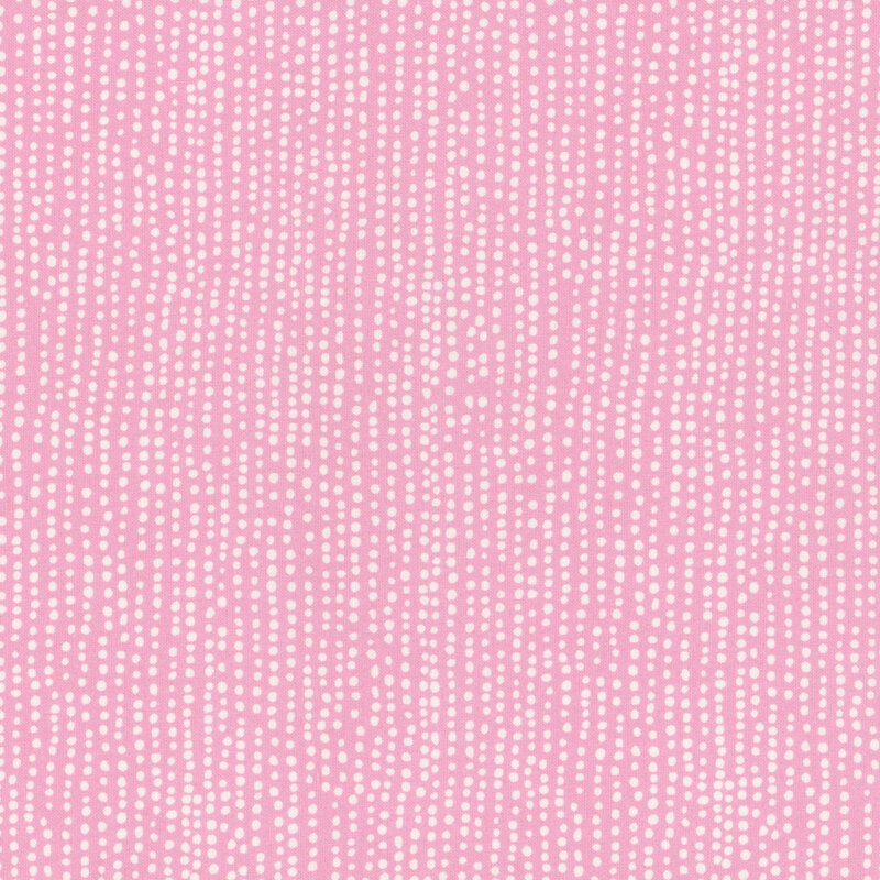 Ballet slipper pink fabric with vertical rows of wobbly white dots.