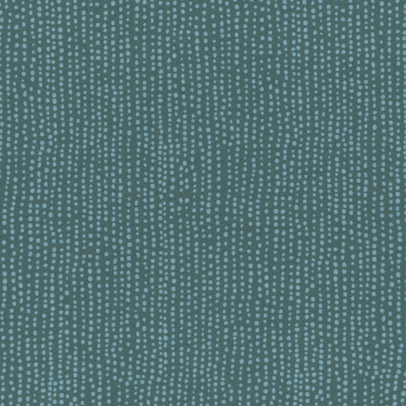 Eucalyptus green fabric with vertical rows of wobbly tonal dots.