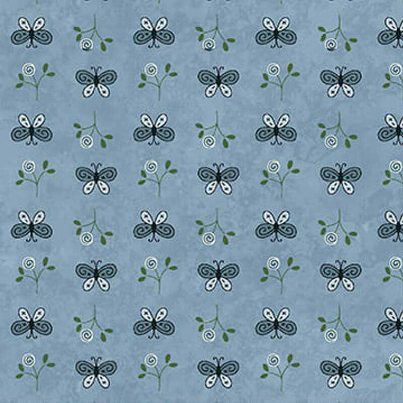 Repeating fabric of butterflies and floral elements on a blue background.