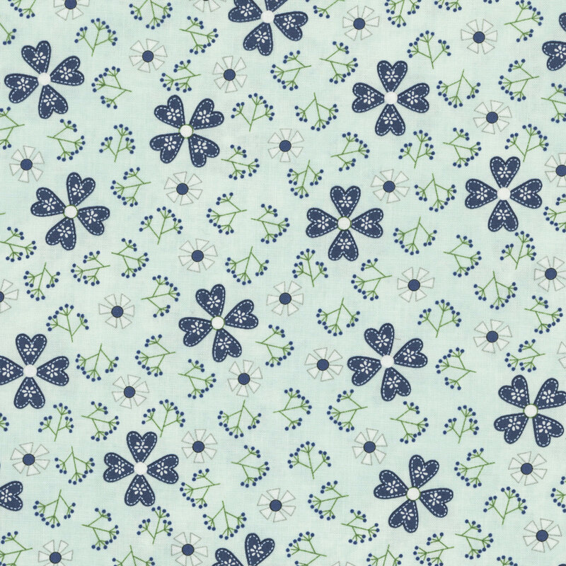 Fabric pattern of blue and white flowers on a pale aqua background with green accents.