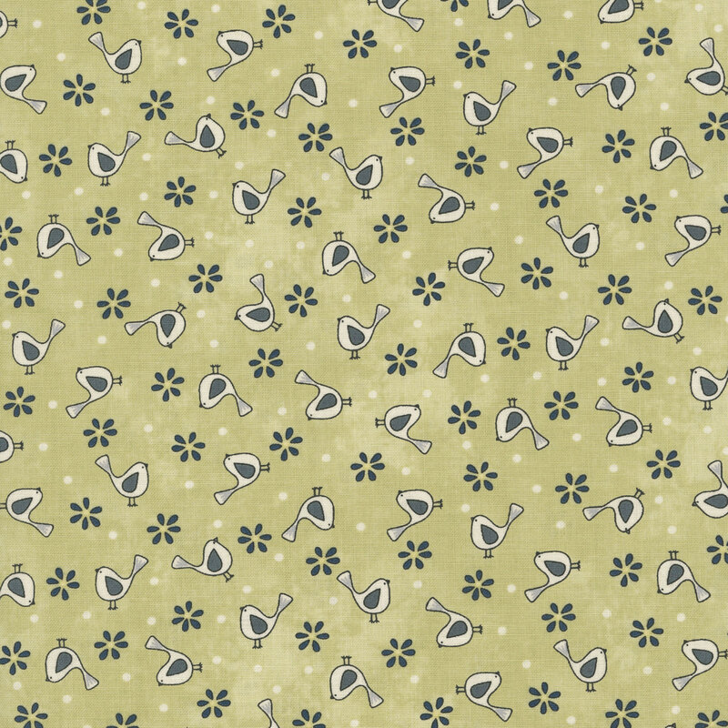 Pattern of whimsical birds and flowers on a mottled light celery green fabric.