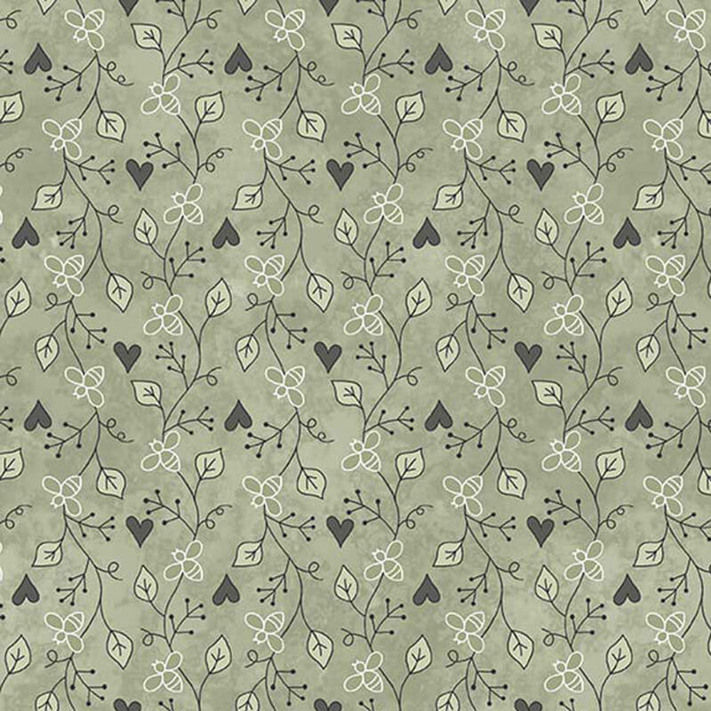 Floral fabric pattern featuring leaves and flowers in white, with black hearts on a muted green background.
