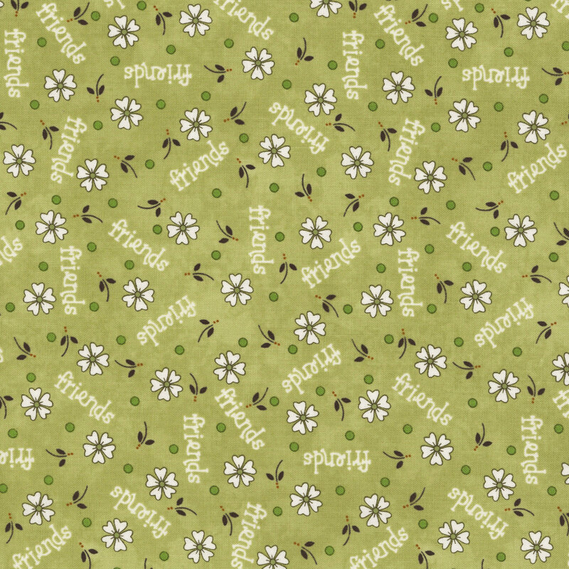 Patterned green fabric featuring white flowers, green dots, and the word "friends" repeated throughout.