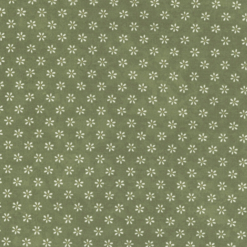 A sage green fabric with a repeated pattern of small white flowers.