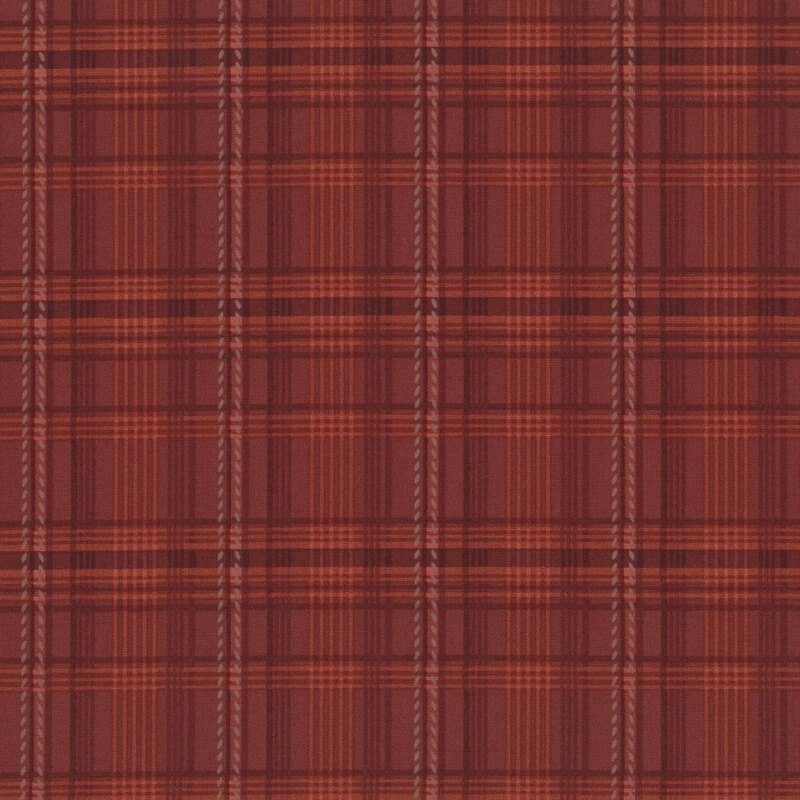 plaid pattern on tonal red fabric