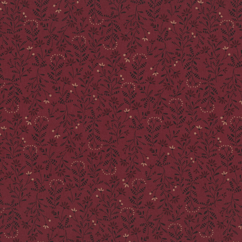 brick red fabric featuring a primitive pattern of latte and maroon flowers with dark brown leaves and stems