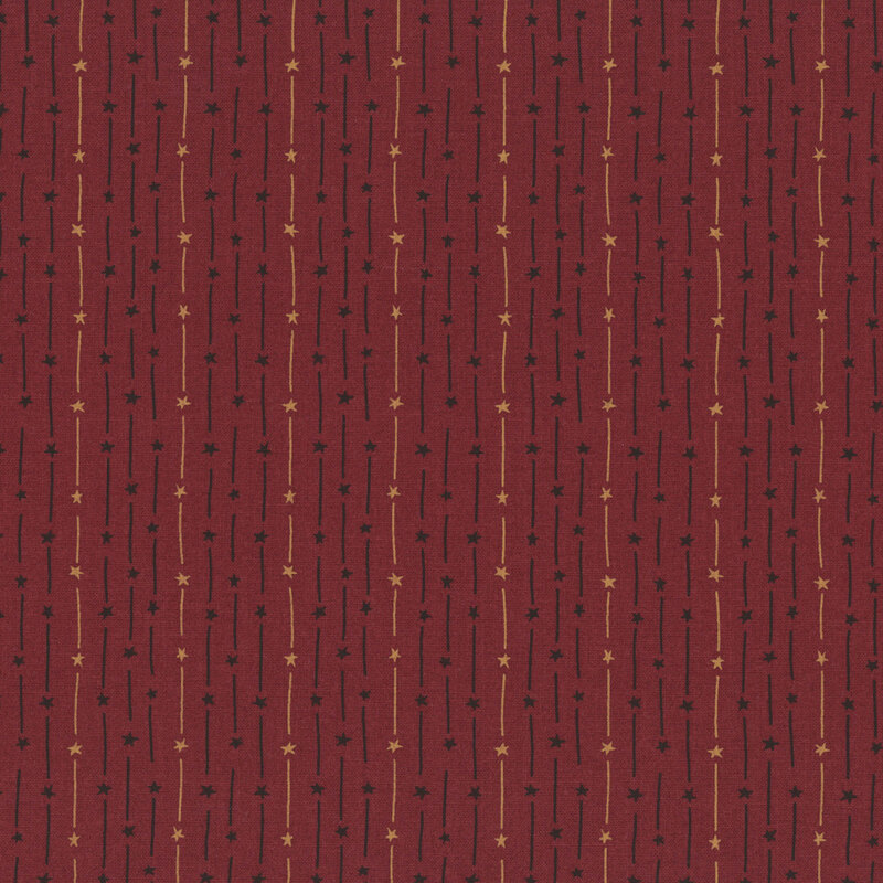 black and brown shooting stars in alternating stripes on brick red fabric