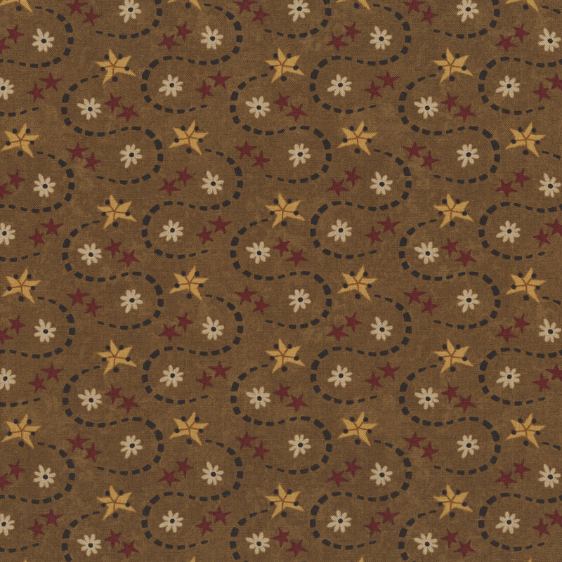 brick red stars, shooting tan stars with a dark green tail, and cream flowers tossed on a brown fabric