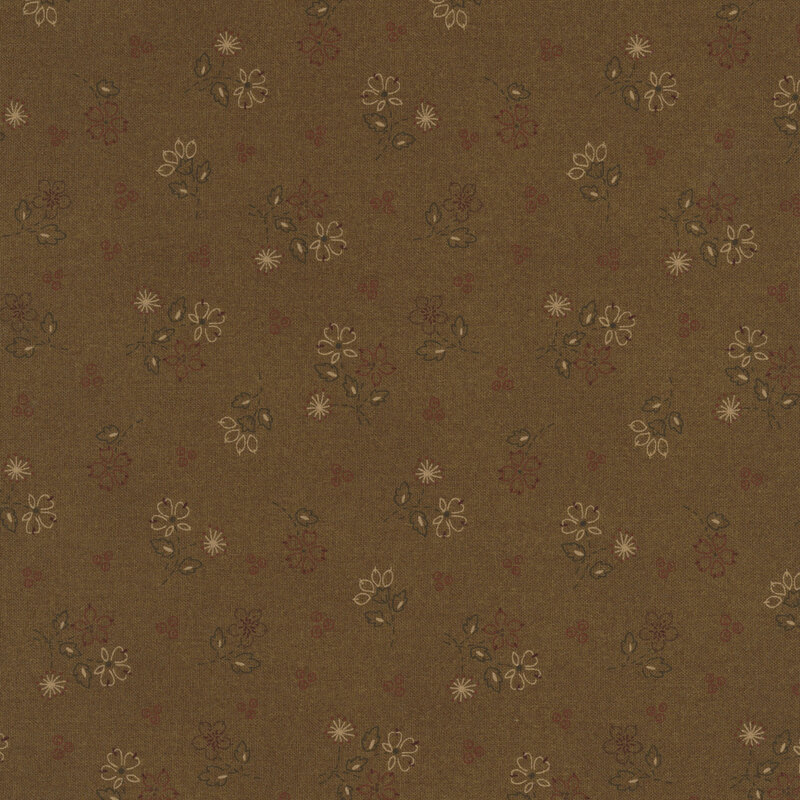 latte and brick red flowers with evergreen leaves and stems scattered on earth brown fabric