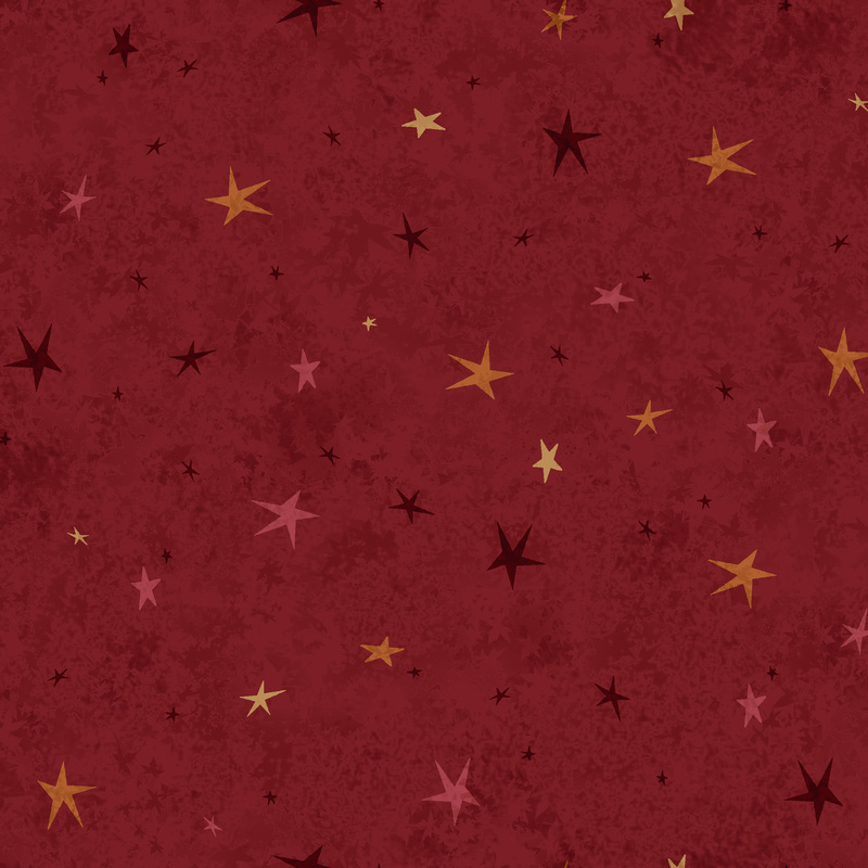 A red fabric featuring a tonal star-themed design.