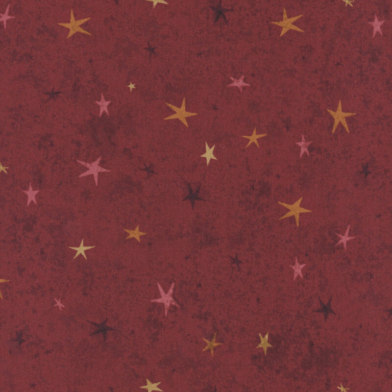 A red fabric featuring a tonal star-themed design.